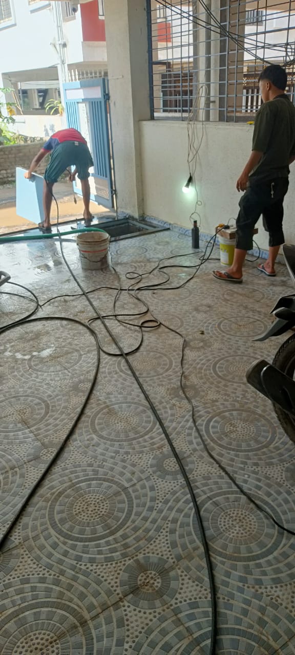 Commercial tank cleaning at work